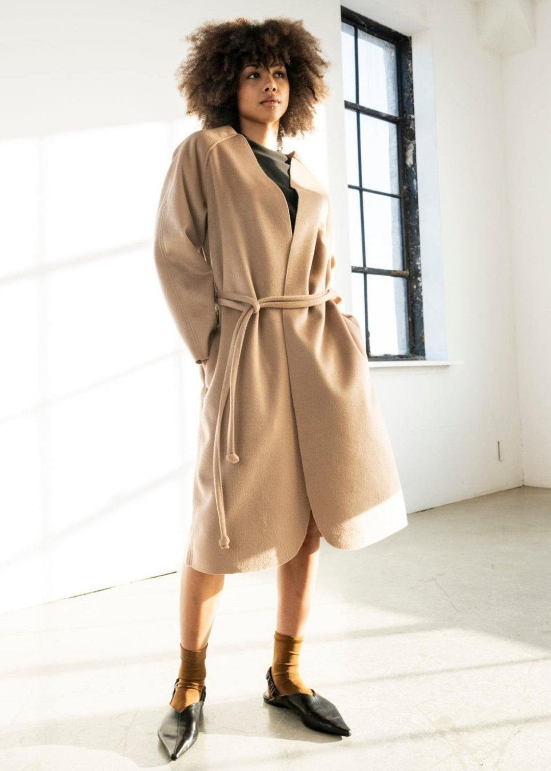 Long mid-calf length jacket
Veste longueur mi-mollet