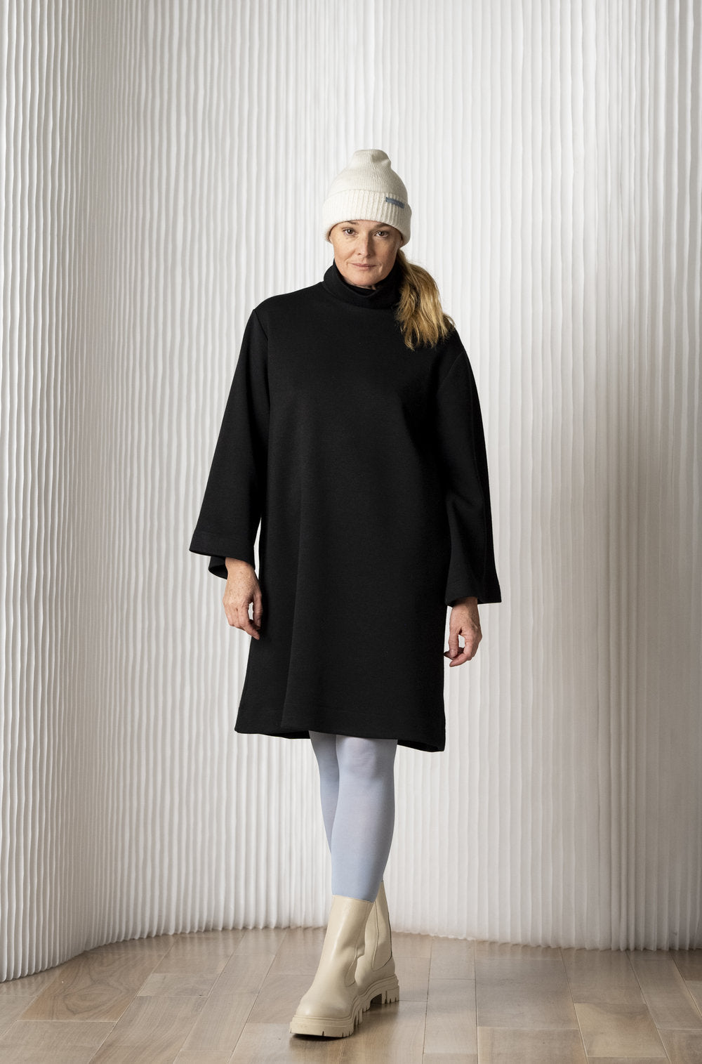 oslo-linea-long-flare-sleeve-black-dress-pockets-knit